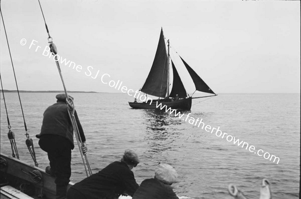 BOATS AND BOATMEN WITH LIFEBOAT TO INNISHMAAN